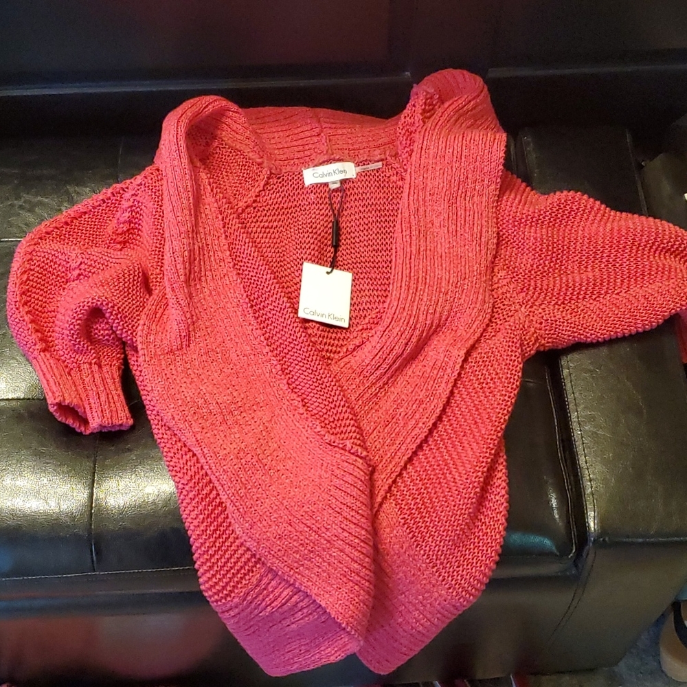 Short sweater like. (Not sure how to describe)
